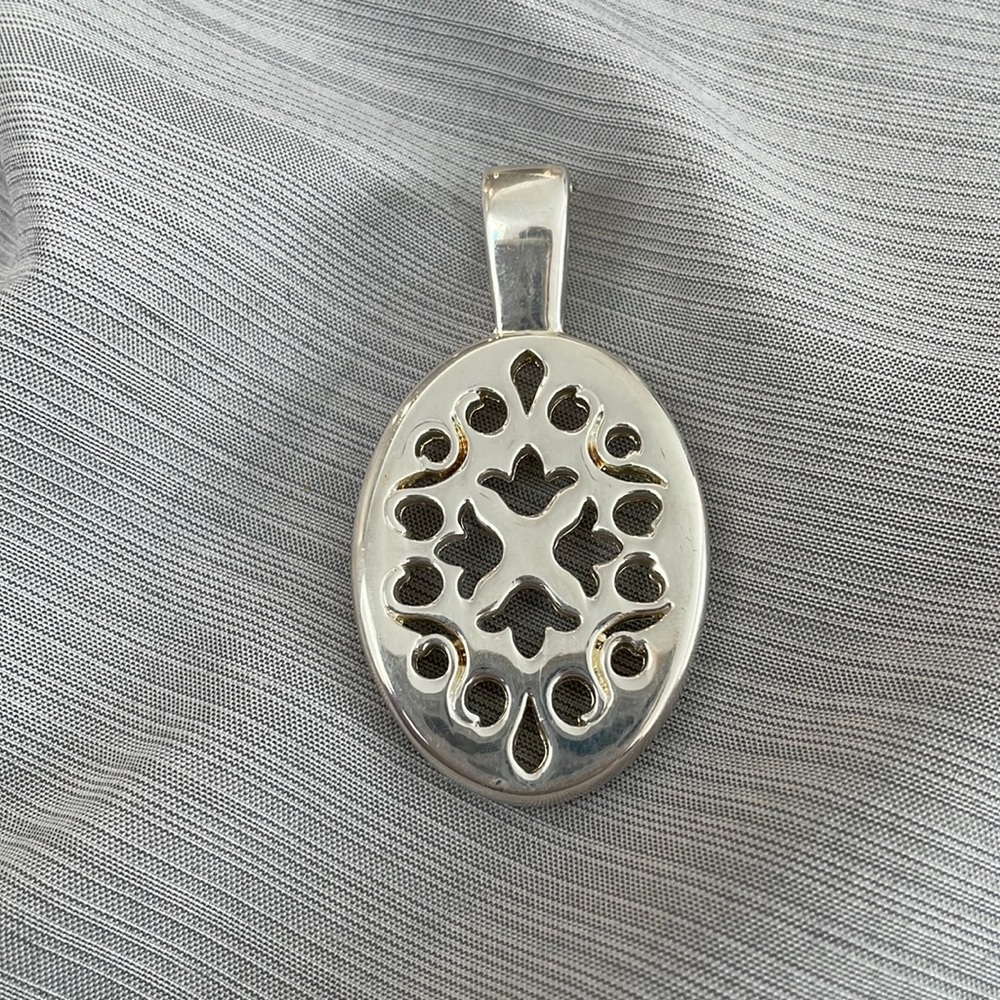 Premier Designs reversible pendant.